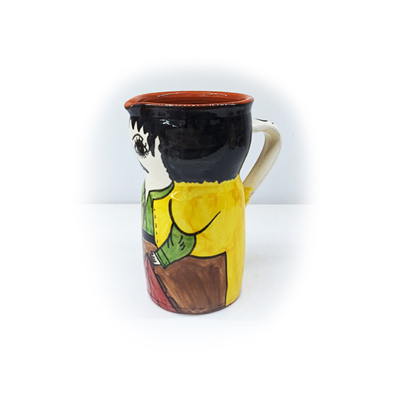 Ceramic pitcher with typical figure