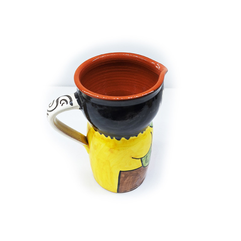 Ceramic pitcher with typical figure