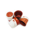 Set of 4 small clay cups