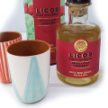 Set of prickly pear liqueur and 4 small cups