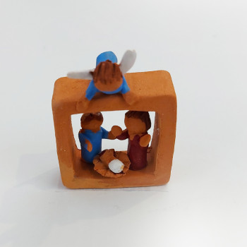 Nativity scene with litle angel