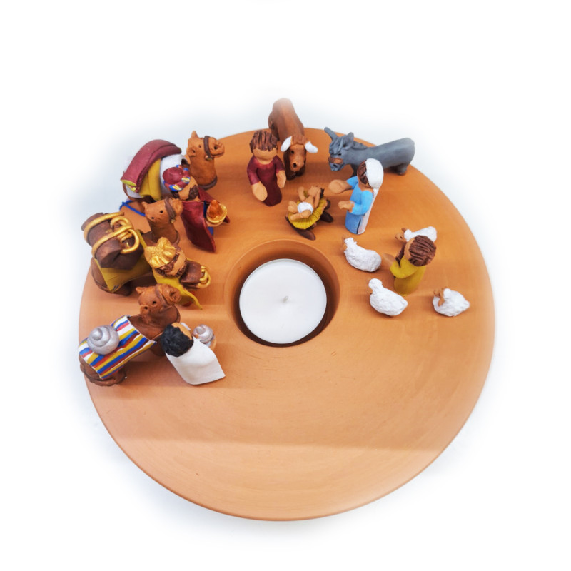 Nativity scene with a candle