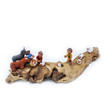 Nativity scene in a wooden log